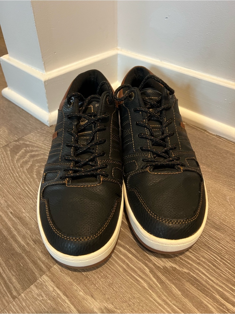 Levi's Black Sneakers with Brown Stitching and White Sole